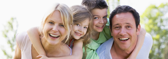 Chiropractic Upland CA Family Children On Backs of Parents Chiropractic Upland CA Family Children On Backs of Parents