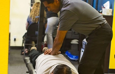 Chiropractor Upland CA Raul Castillo Adjusting Patient